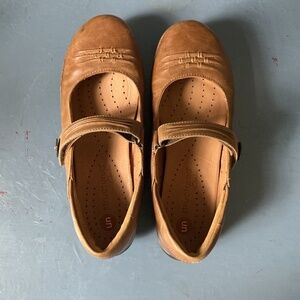 Clark’s “unstructured” tan Mary Jane Flats, size 7 wide